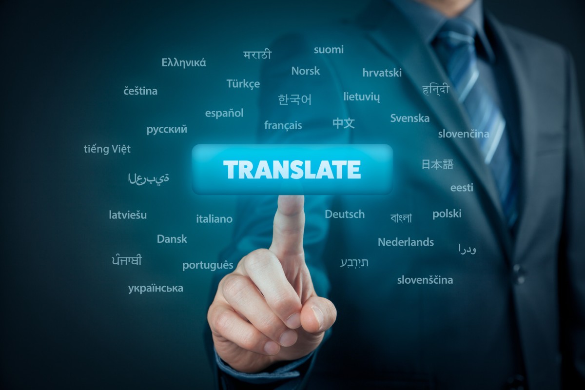 A business professional in a suit pointing at a glowing 'Translate' button, surrounded by various language names in their native scripts, symbolizing global language translation and communication.